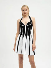 Flared halterneck knit dress